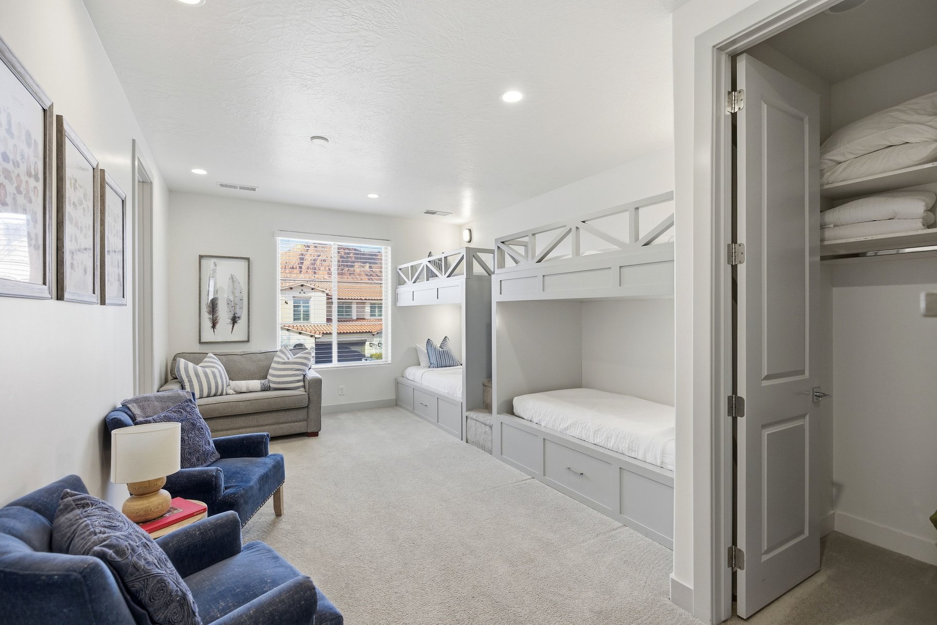 Bedroom featuring light carpet and recessed lighting