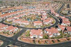 Aerial overview of property's location featuring nearby suburban area