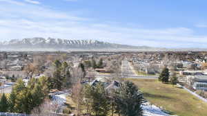 View of mountain background featuring nearby suburban area