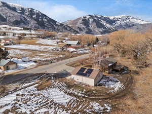 Snowy aerial view with a mountain view