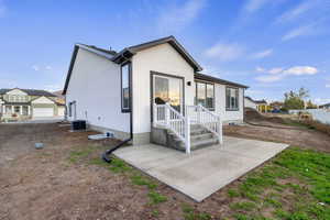 Rear view of house with a patio