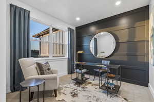 Sitting room with carpet and recessed lighting
