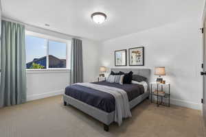 Bedroom featuring carpet floors