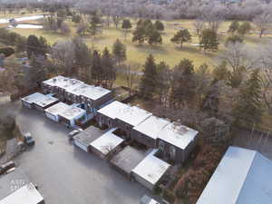 Aerial perspective of suburban area featuring a tree filled landscape