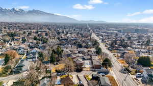 View of property location with a mountainous background and nearby suburban area