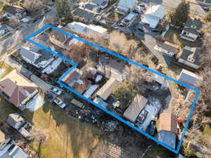 Aerial perspective of suburban area with property boundaries highlighted