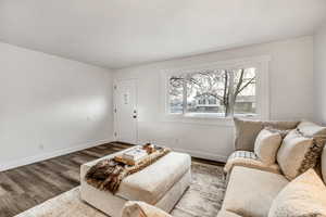 Living area with wood finished floors