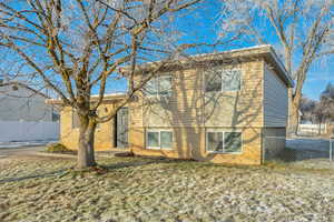 View of front of house featuring brick siding