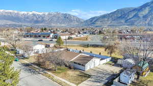 Aerial view of residential area with a mountainous background