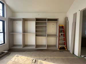 Priimary closet with built-in closet