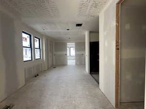 From primary closet into primary bathroom