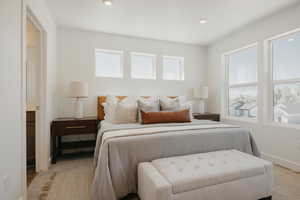 Bedroom featuring baseboards