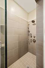 Bathroom with tiled shower