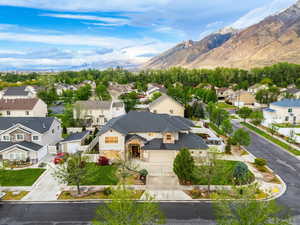 Aerial perspective of suburban area with a mountain backdrop