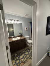 Bathroom with a shower with curtain, vanity, and a textured ceiling