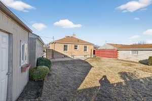View of fenced backyard