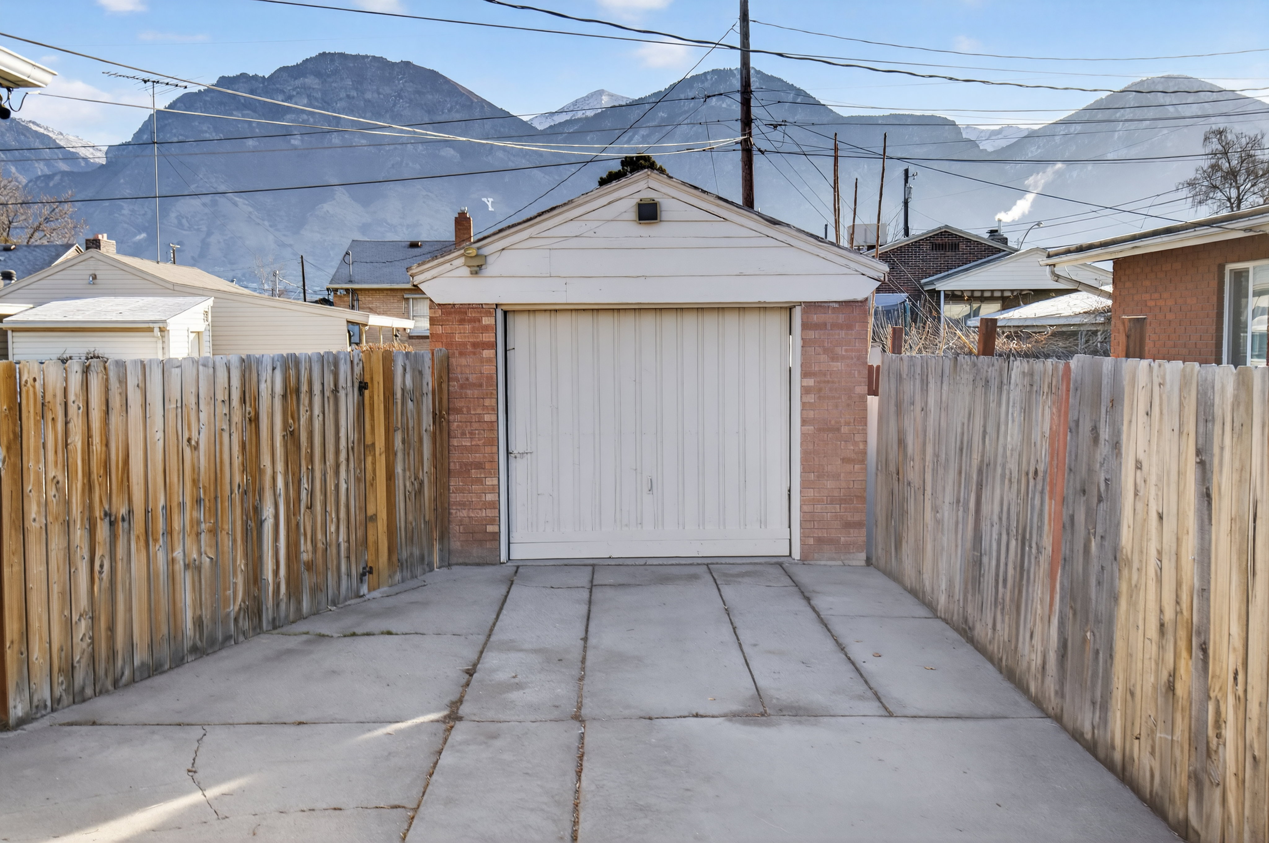 Garage featuring a mountain view