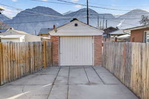 Garage featuring a mountain view
