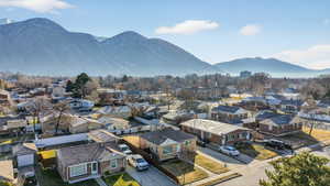 Aerial view of residential area with a mountainous background