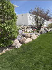 View of yard with a gate