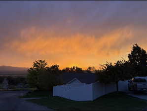 View of property exterior at dusk