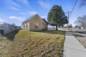View of side of property with brick siding