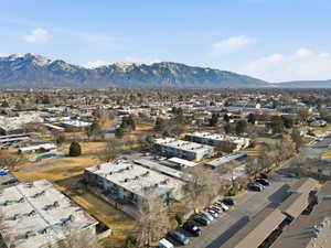 Aerial perspective of suburban area featuring a mountainous background