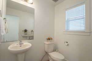 Half bathroom with toilet