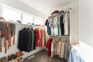 Walk in closet featuring carpet