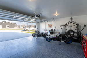 Garage with a residential view and a garage door opener