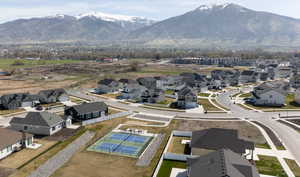 Aerial view of residential area featuring mountains