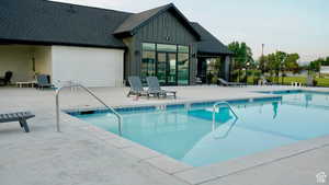 Community pool featuring a patio area