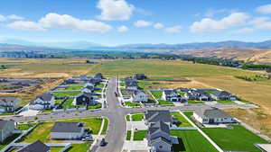 Aerial view of residential area featuring mountains