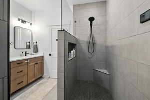 Primary Bathroom with vanity and a walk in shower