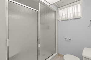 Bathroom with a shower stall