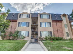 View of apartment building / complex with stairs