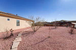 View of fenced backyard