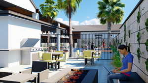 View of patio / terrace featuring an outdoor fire pit and area for grilling