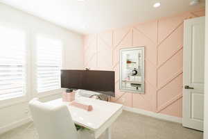 Office area featuring light colored carpet and recessed lighting