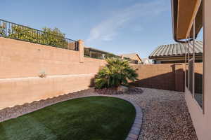 View of fenced backyard