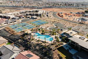 Aerial view of property's location featuring a pool