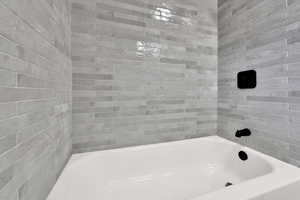 Full bathroom with washtub / shower combination