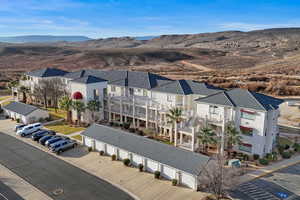Aerial view of residential area with a mountainous background