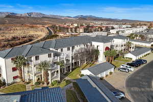 Aerial view of residential area featuring mountains