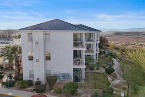 View of apartment building / complex with a mountain view