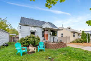 Bungalow-style house featuring a shingled roof