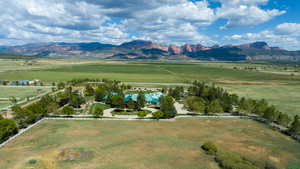 View of mountain backdrop featuring rural landscape