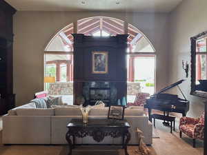 Living room with carpet and a fireplace