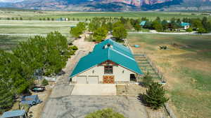 Overview of rural landscape featuring a mountain backdrop