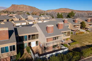 Aerial view of residential area with a mountain backdrop